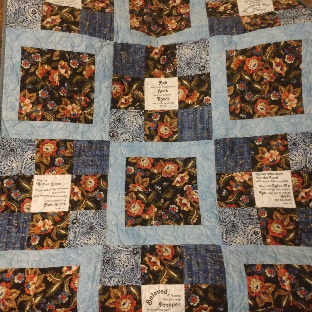 Elegant Blue and Black Floral Quilt